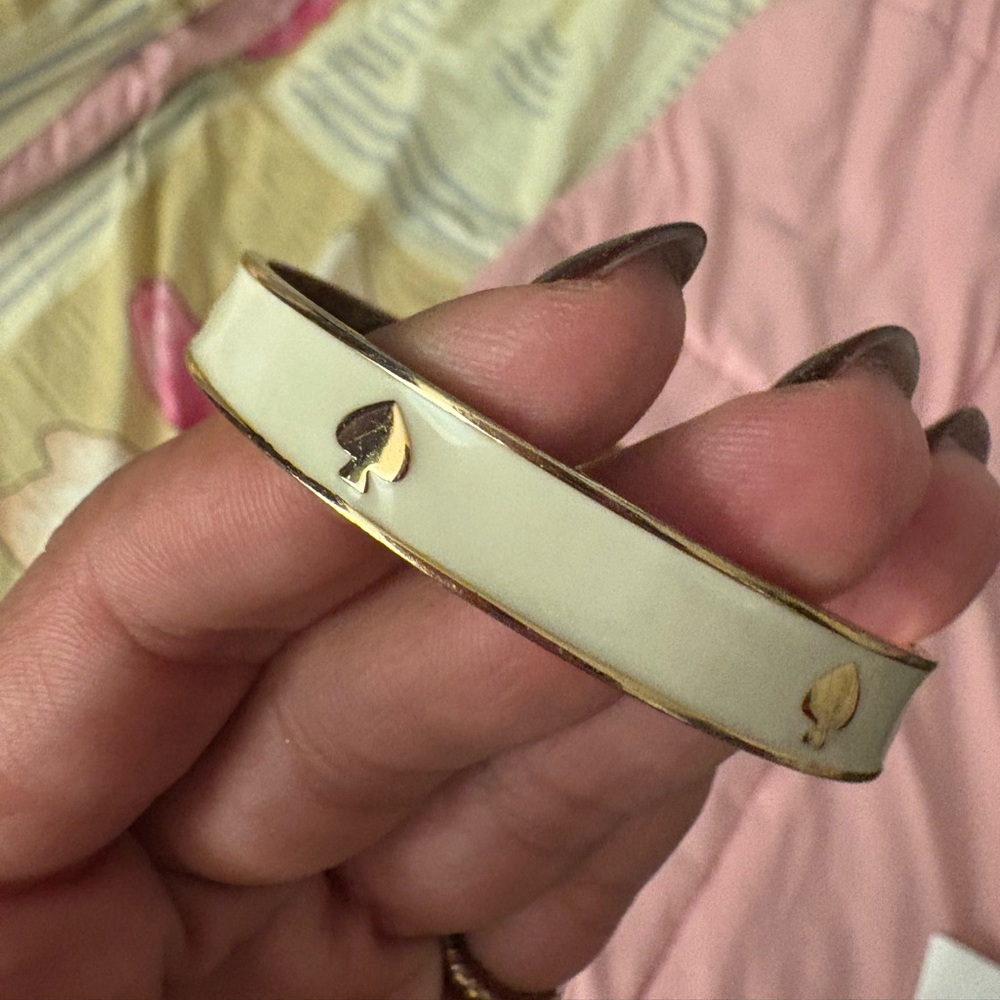 Kate Spade Ivory and Gold Spade Bangle